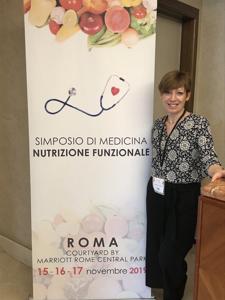 Locandina del Simposio di Medicina Nutrizione Funzionale di Roma Novembre 2019 e la Dott.ssa Proietti Cesaretti